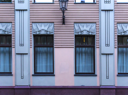 Windows in the house in the Art Nouveau style. Decorated walls and window frames. Russia Moscow . The end of the 19th century.の写真素材