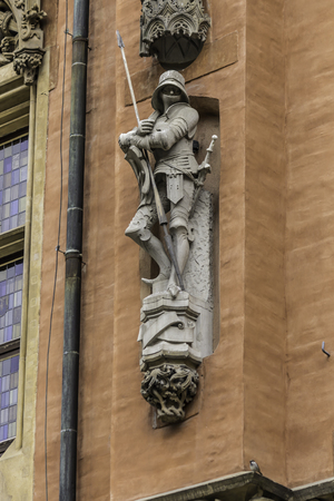 Detail of the facade of the medieval Town Hall. Sculptures,stone decoration.Mixed style of architecture - Gothic and Baroque. Vroslav,Poland.の写真素材