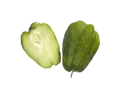 organic choko Sechium edule vegetable pear cut in halfの写真素材