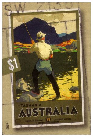 circa 2007 :  an Australian postal stamp cancelled depicting fly fishing in Tasmaniaの写真素材