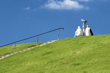 Active seniors sitting and relaxingの写真素材