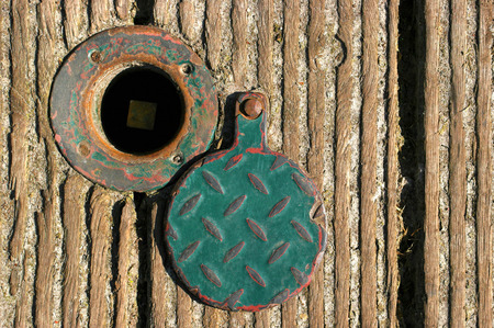 Key hole on a wood bridgeの写真素材