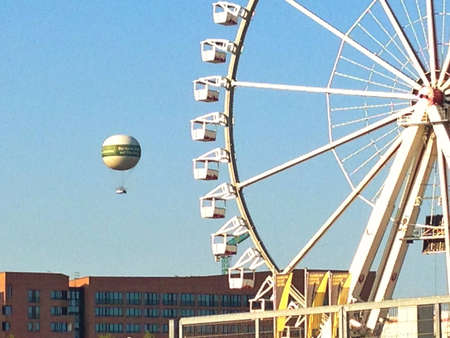 First will and hot air balloon at a festival in Hamburg Germanyの素材