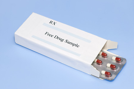 Free drug samples are given to physicians by drug companies.の写真素材