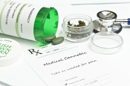 Medical marijuana prescription with bottle and stethoscope.の写真素材