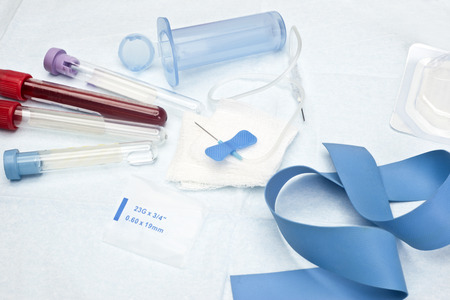 Butterfly catheter with blood sample collection tubes and supplies.の写真素材