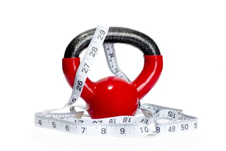 Red workout weight with tape measure.の写真素材