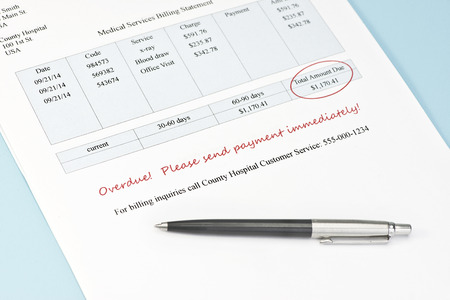Overdue hospital bill with black pen.  Document and all information contained therein is fictitious.