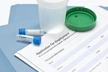 Application for employment with urine specimen container and sample tubes.