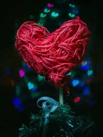 A card with a heart as a recognition of their tender love for a person on a bright holiday, on St....