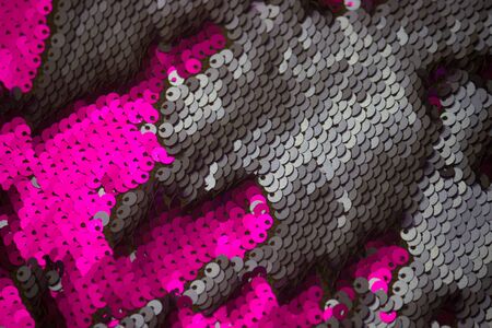 Pattern on a pillowcase with sequins pillows. Pillows that change color. Mother of pearl sequins on sofa cushions.の写真素材