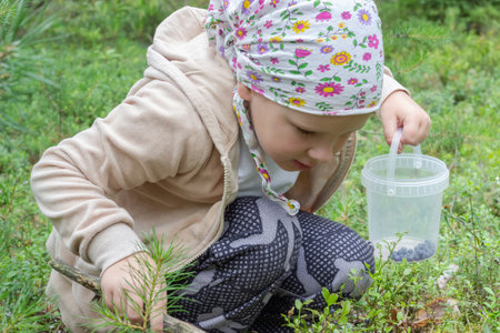 Children explore the forest during a tourist walk.の写真素材
