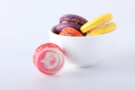 tasty colorful macarons on white backgroundの写真素材