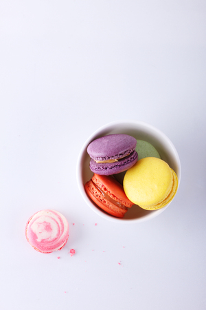 tasty colorful macarons on white backgroundの写真素材