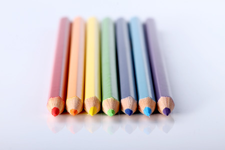 colored pencils line up in rainbow,selective focusの写真素材