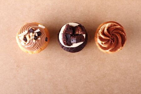 swirl icing topping of three cupcakesの写真素材