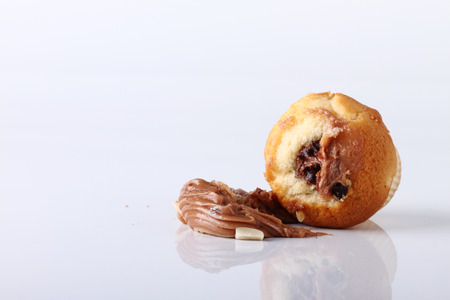 collapsed cupcake on white backgroundの写真素材