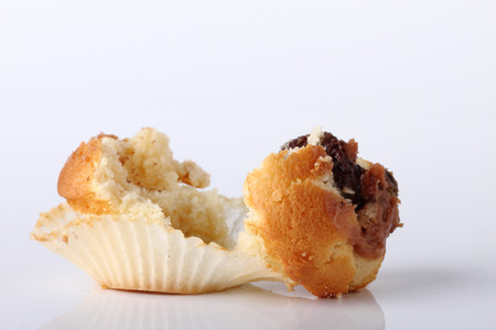 splited cupcake on white backgroundの写真素材