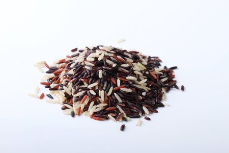 long grain rice,brown rice, keep healthy concept, white backgroundの写真素材