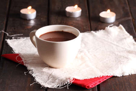 hot chocolate in cup with candlesの写真素材