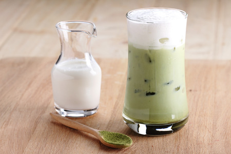 glass of iced green tae latteの写真素材