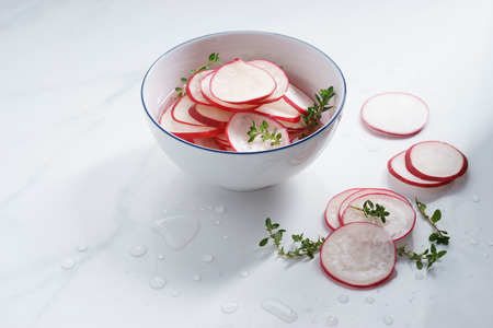 bowl of pickled sliced radish