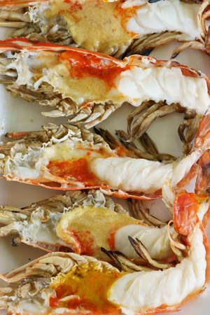 grilled giant river prawn with yellow creamy fat on headの写真素材