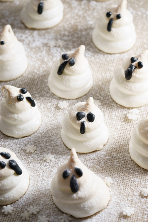 little cute ghost meringue cookies for halloween specialの写真素材
