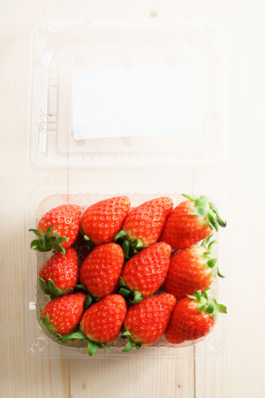 fresh strawberries in plastic boxの写真素材