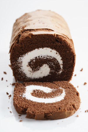 dark chocolate cake roll with cream fillingの写真素材