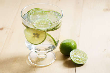 lime juice, detox natural drink, on wooden backgroundの写真素材