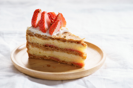 layered cake with fresh strawberry and creamの写真素材