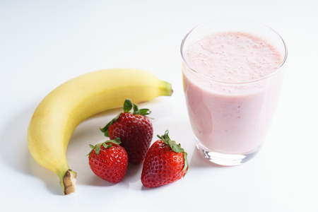 Healthy fresh strawberry and banana smoothieの写真素材
