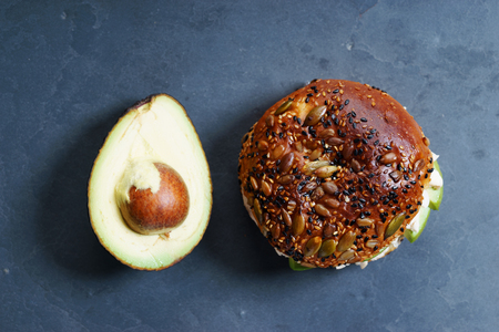 healthy burger with sliced avocado, chicken and wholegrain breadの写真素材