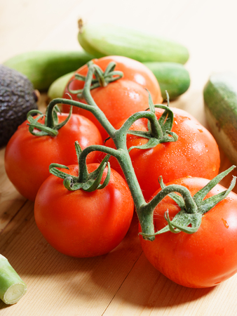 Assortment of summer vegetables, healthy food ingredients on wooden background
の写真素材