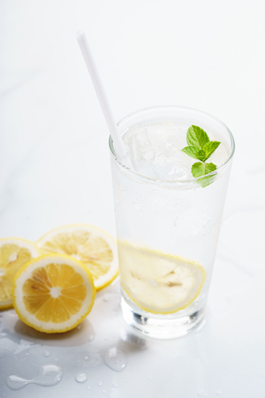 lemon soda with fresh lemon slices and mint leavesの写真素材
