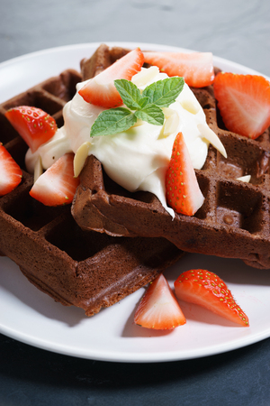 Chocolate waffle with fresh strawberriesの写真素材