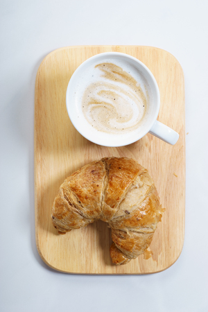 Cup of coffee and croissant, breakfast conceptの写真素材