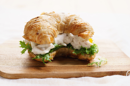 croissant sandwich with chicken cream saladの写真素材