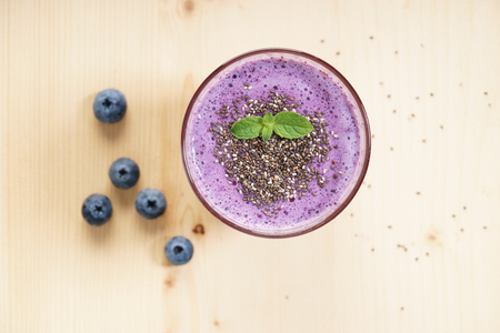 blueberry smoothie with chia seeds on wooden backgroundの写真素材