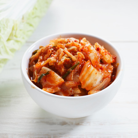 Kimchi in white bowl, Korean traditional foodの写真素材