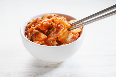 Kimchi in white bowl, Korean traditional foodの写真素材
