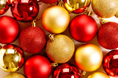 Chirstmas holiday festive baubles with red and golden color. top view, closeup.の写真素材