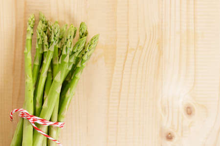 Bunch of fresh green asparagusの写真素材