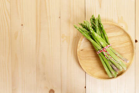 Bunch of fresh green asparagusの写真素材