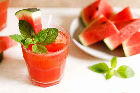 Watermelon juice in a glass with fresh slice of watermelon.の写真素材
