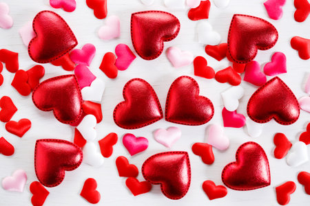 Red hearts on wooden background. Decorations for Valentines day.の写真素材