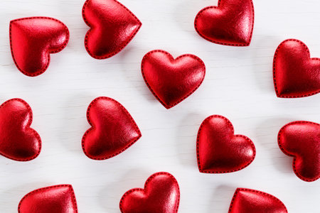 Red hearts on wooden background. Decorations for Valentines day.の写真素材