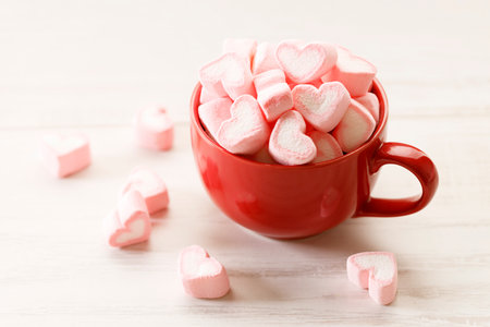 Red and pink candy hearts background. Valentines day and love concept.の写真素材