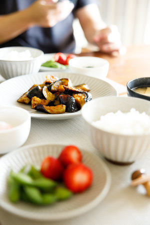 Japanese breakfast, Traditional japanese food including rice, eggplant fried with sauce, miso soup...